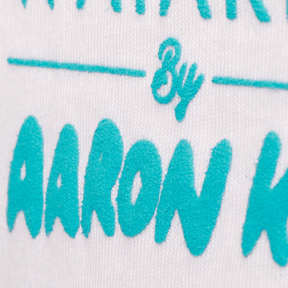 text on fabric by Aaron K