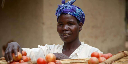 Woman handling fruit