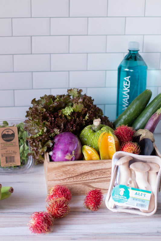 Waiakea water surrounded by produce