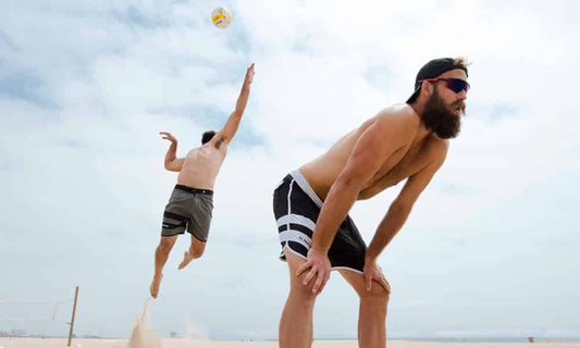 The McKibbin brothers playing beach volleyball