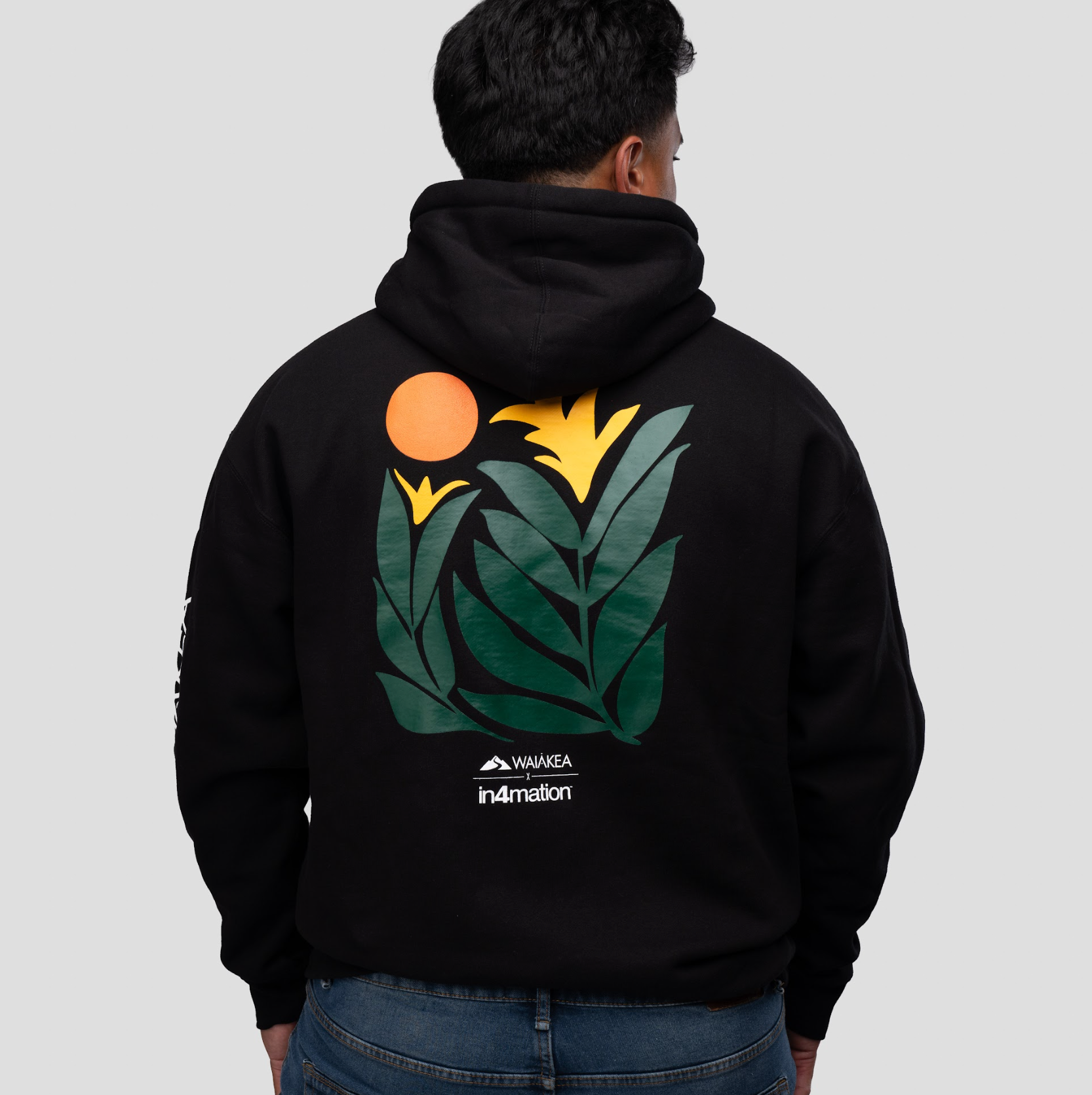 Black hoodie with colorful floral design on back