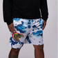 "blue splatter design shorts with surfer graphic"