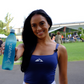 Woman holding Waiakea water bottle outdoors