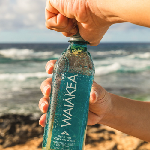 Waiakea volcanic water bottle ocean background