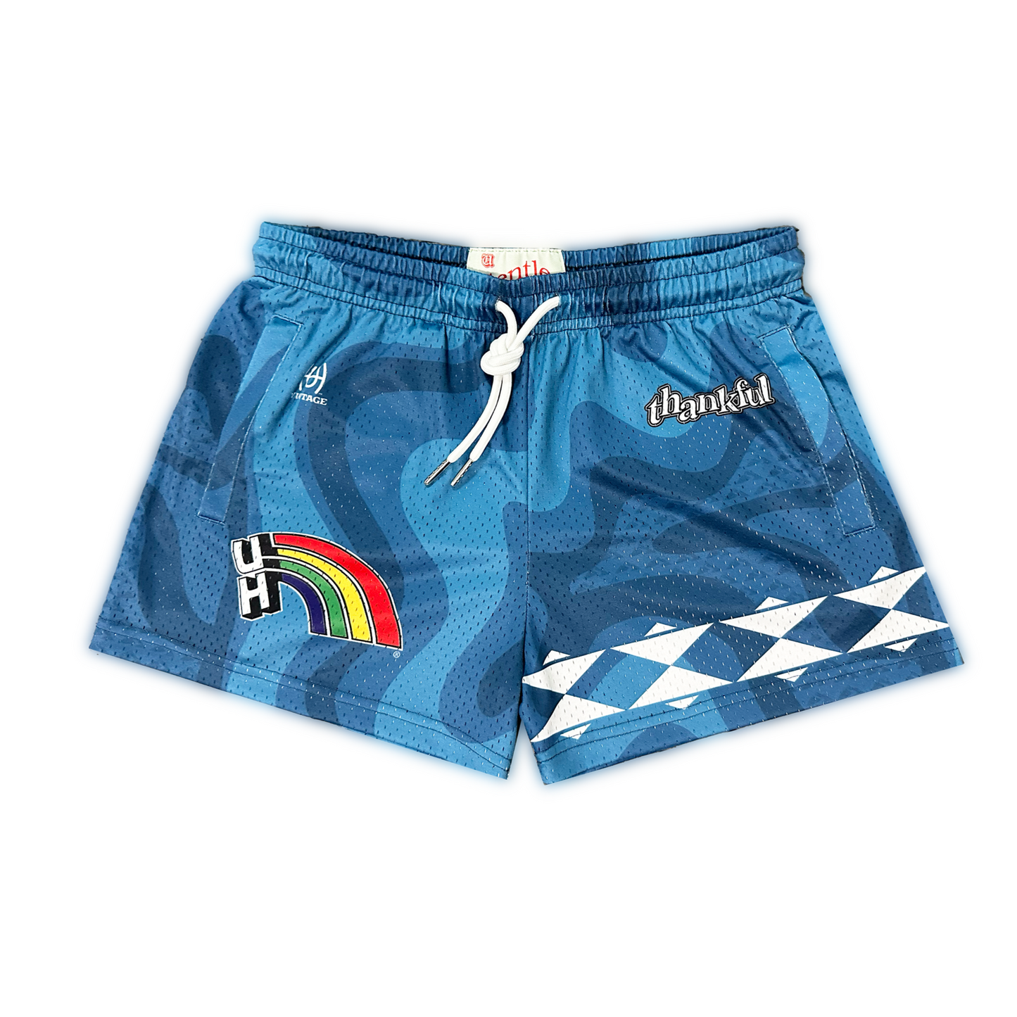 Blue graphic swim shorts with rainbow and thankful design.