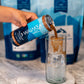 Waiakea Hawaiian coffee can pouring over ice