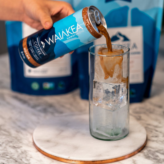 Waiakea Hawaiian coffee can pouring over ice