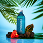 Waiakea Hawaiian volcanic water bottle with tropical leaves and rocks
