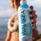 Waiakea Hawaiian volcanic water bottle beach background